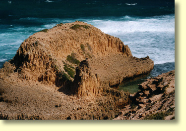 Ospreys like to breed on Rocky Islets. In this picture the Osprey's nest can be seen on a small pinnacle, lower centre frame.